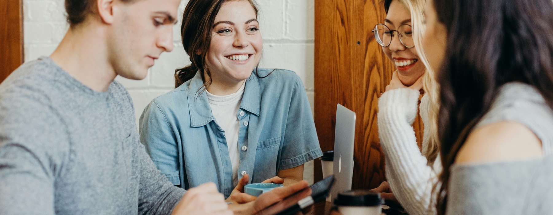 People laughing and working